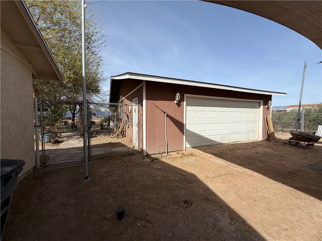 1985 Laguna Road Mohave Valley, AZ 86440 - Photo 69 of 83 Detached garage with a gate