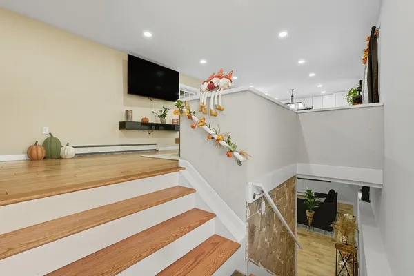 a view of a living room and a flat screen tv