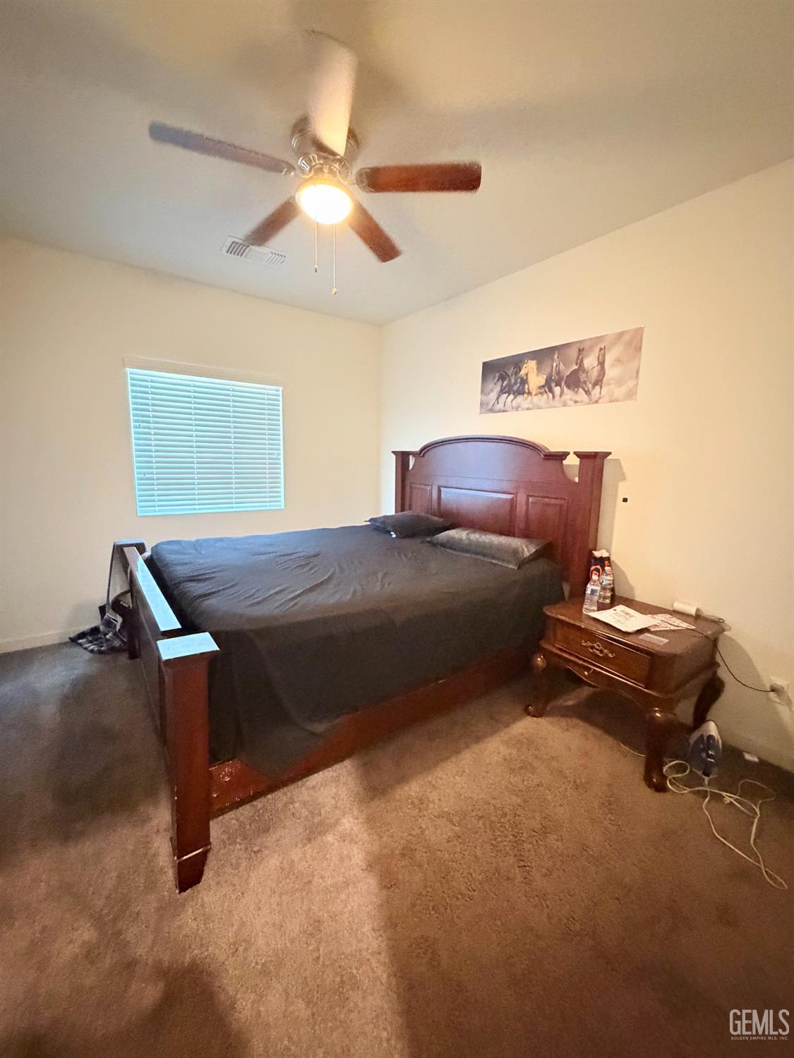 Undisclosed Address Bakersfield, CA 93313 - Photo 15 of 24 a living room with furniture