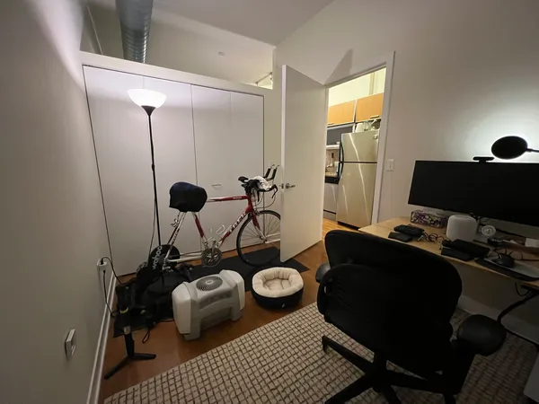 a view of a workspace with furniture