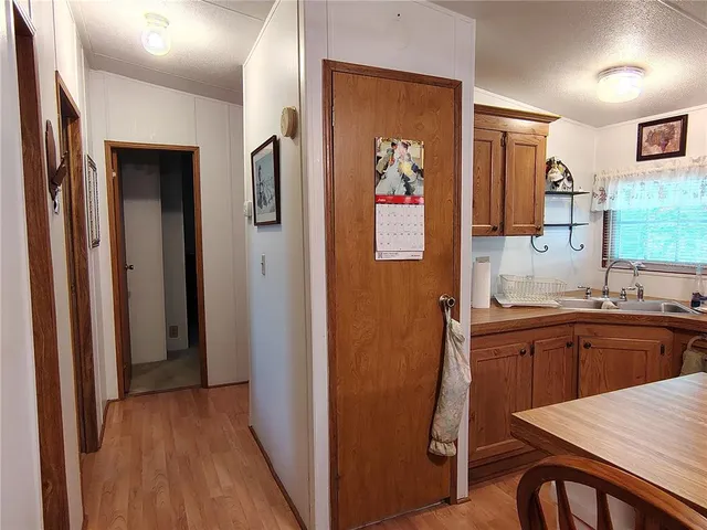 a view of a chair and table in the garden