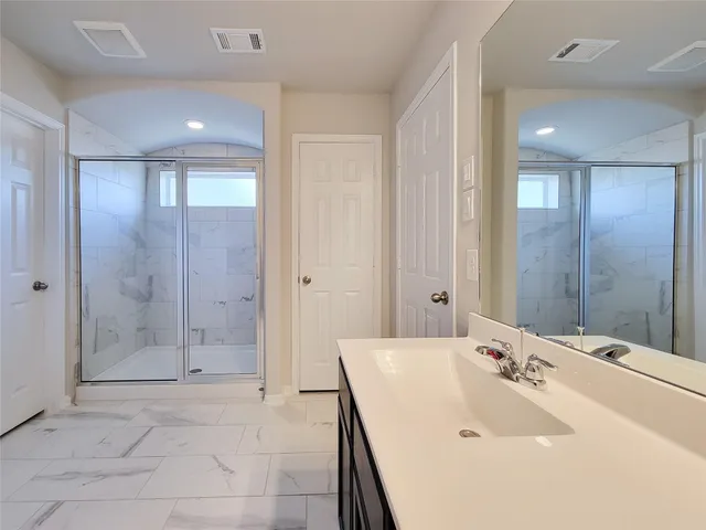 a view of an empty walk in closet