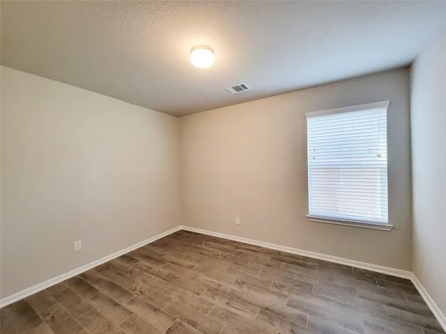 a bathroom with a sink double vanity and a shower
