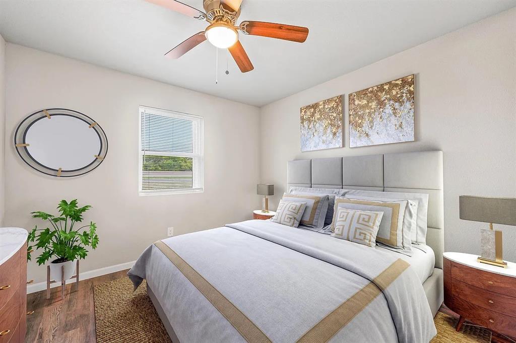 500 Highway 75, Unit 20 Van Alstyne, TX 75495 - Photo 11 of 11 Bedroom featuring wood-finish flooring and a ceiling fan
