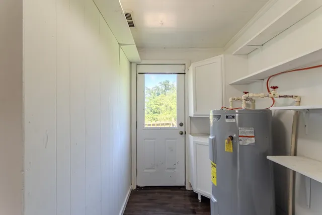 a refrigerator freezer sitting inside of a kitchen
