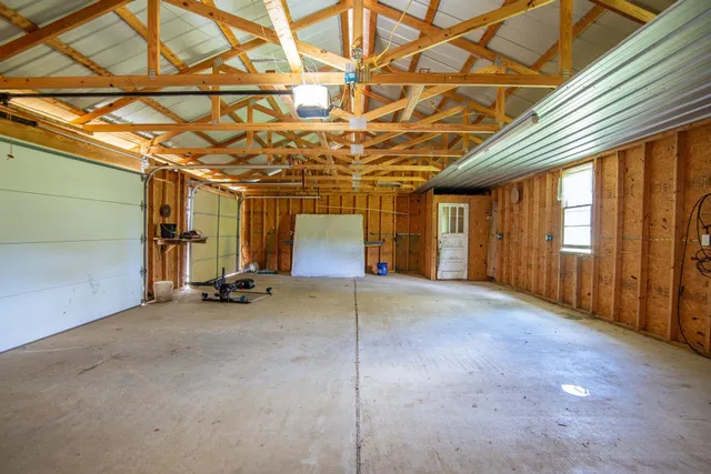 a view of a room with wooden walls