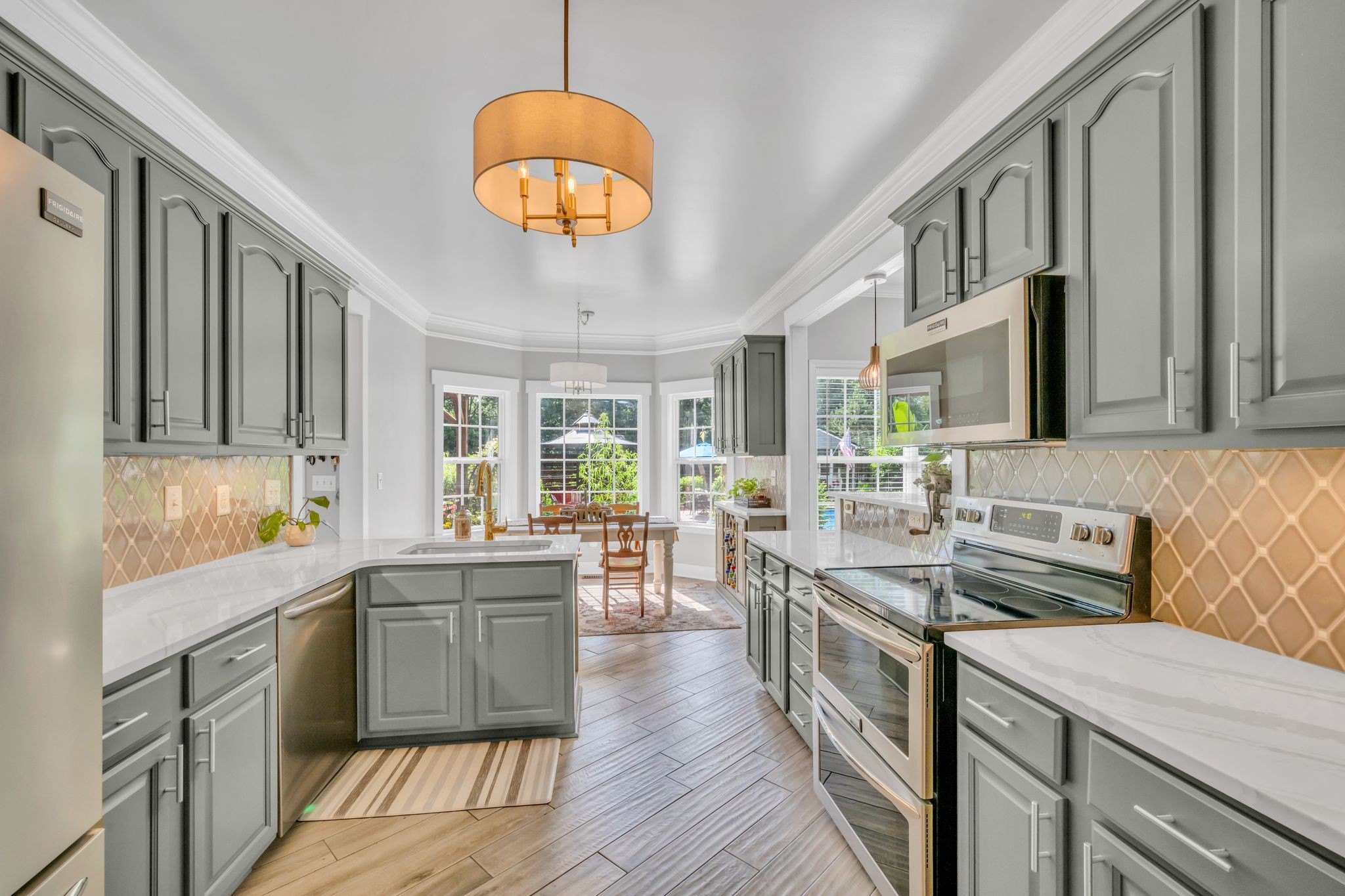 125 Lena Loop Burns, TN 37029 - Photo 21 of 55 Nicely updated kitchen with quartz countertops.