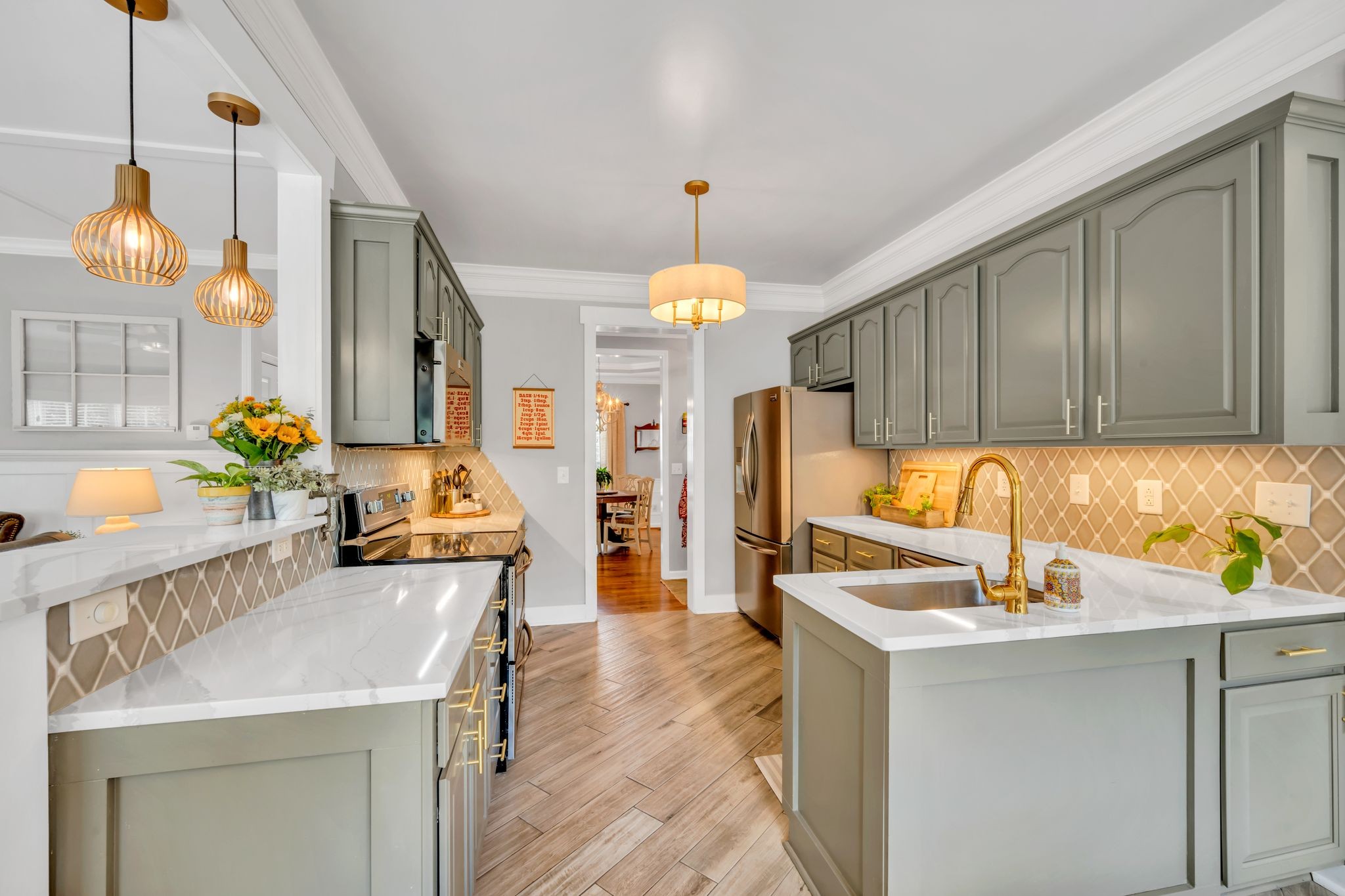 125 Lena Loop Burns, TN 37029 - Photo 23 of 55 a kitchen with a sink refrigerator and cabinets