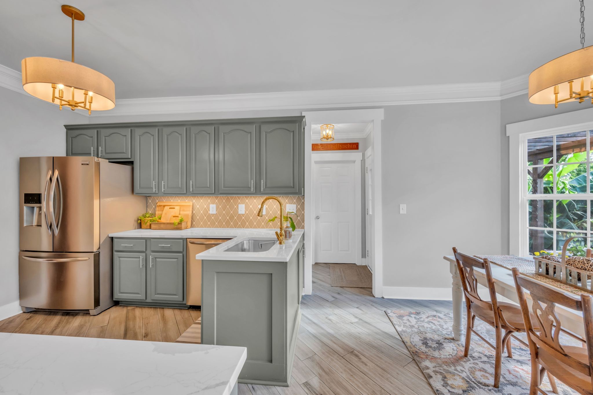125 Lena Loop Burns, TN 37029 - Photo 24 of 55 a kitchen with granite countertop a refrigerator and a stove top oven