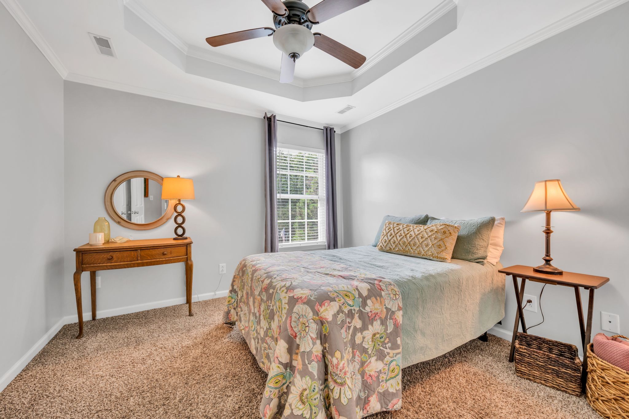 125 Lena Loop Burns, TN 37029 - Photo 42 of 55 a bedroom with a bed and a chandelier