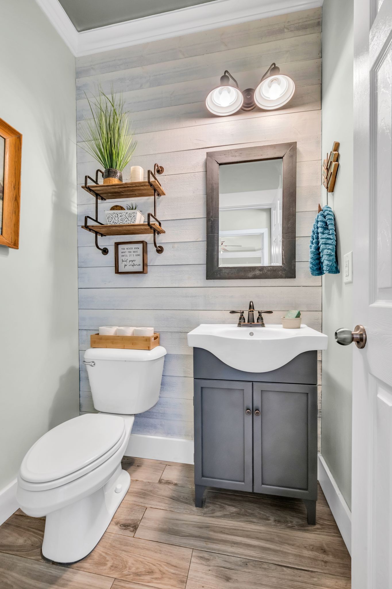 125 Lena Loop Burns, TN 37029 - Photo 45 of 55 This is the half bath on the main floor.