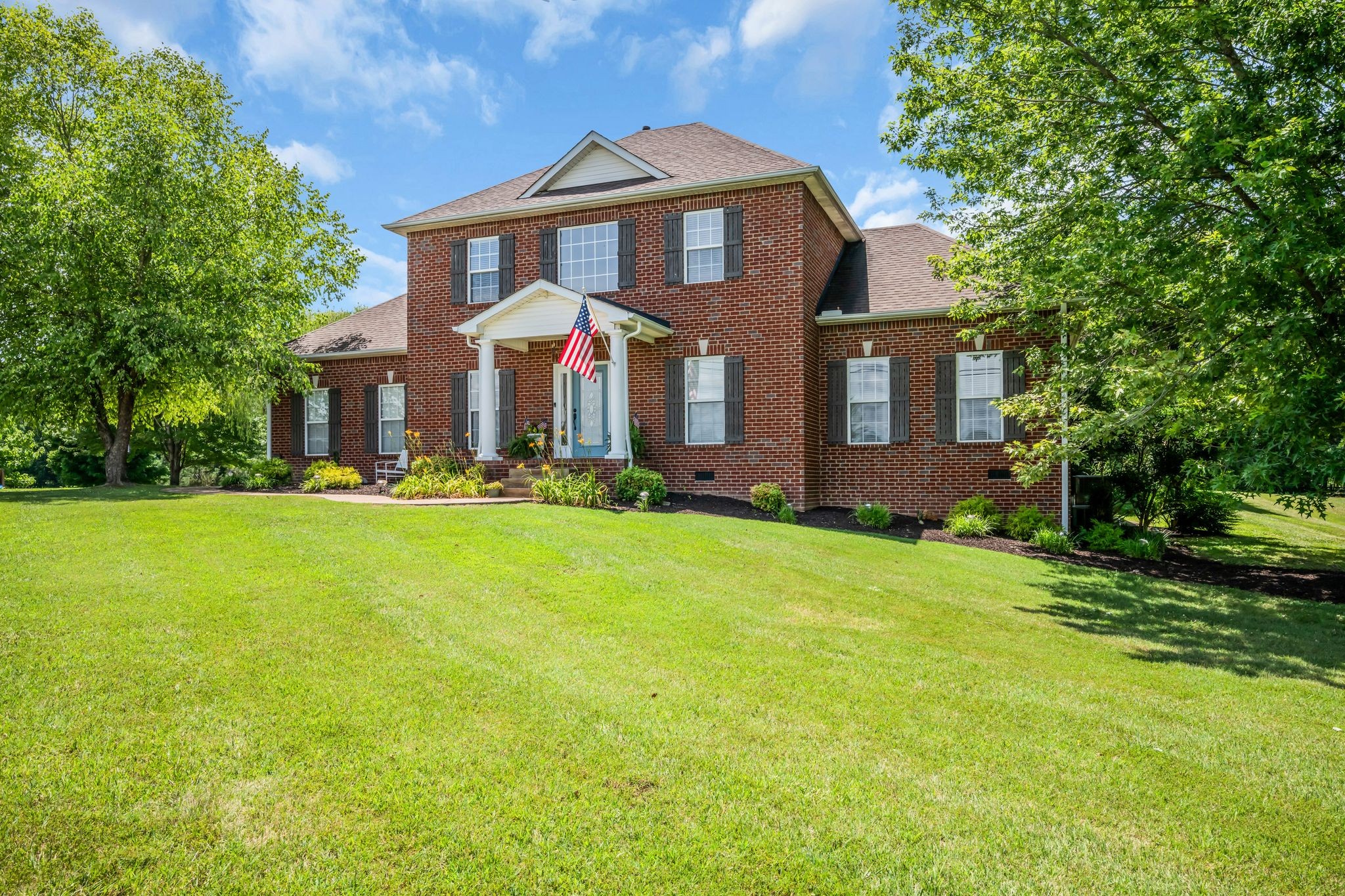 125 Lena Loop Burns, TN 37029 - Photo 50 of 55 a front view of house with yard and green space