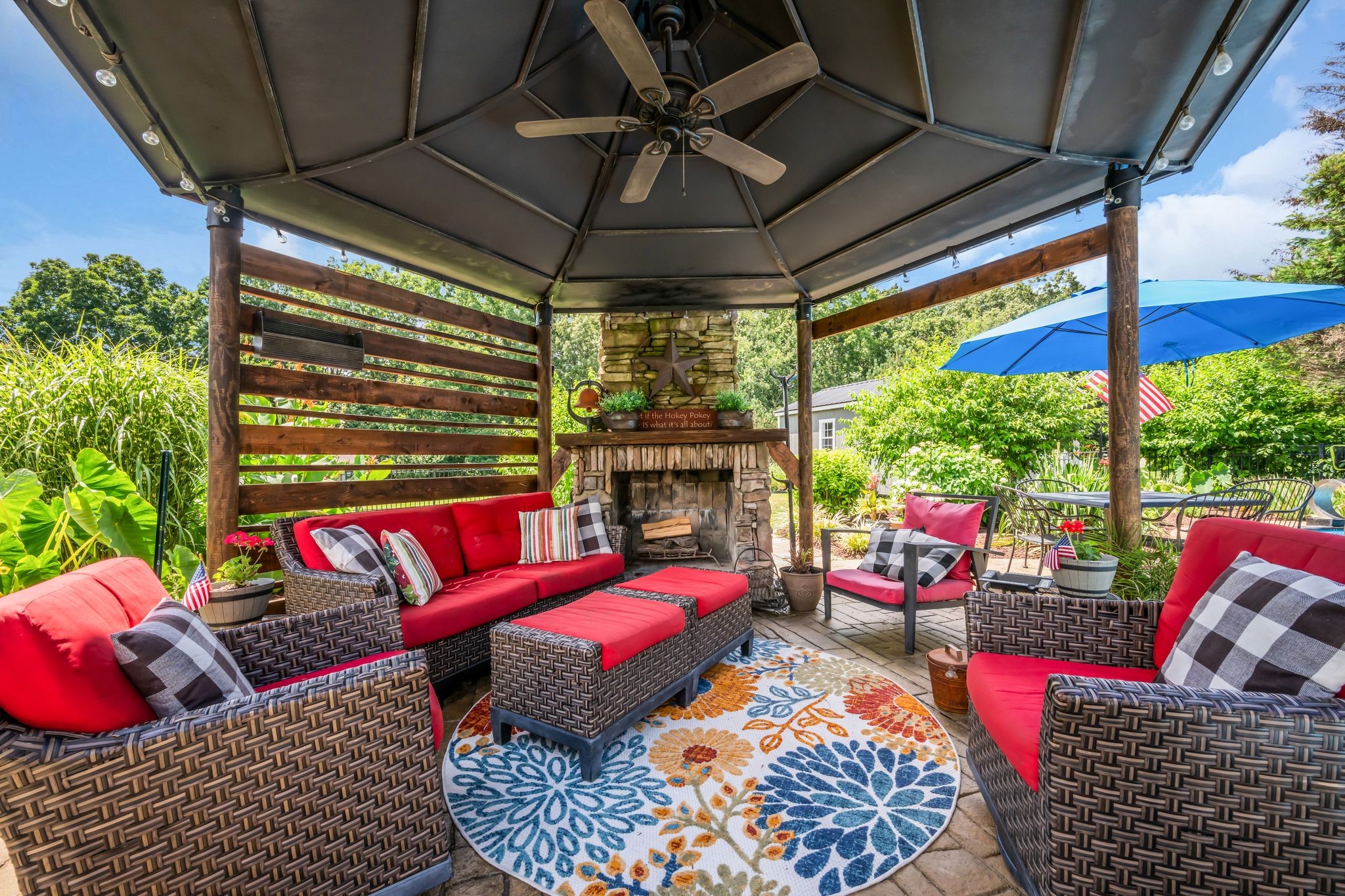 125 Lena Loop Burns, TN 37029 - Photo 9 of 55 a outdoor space with patio the couches and a dining table with chairs