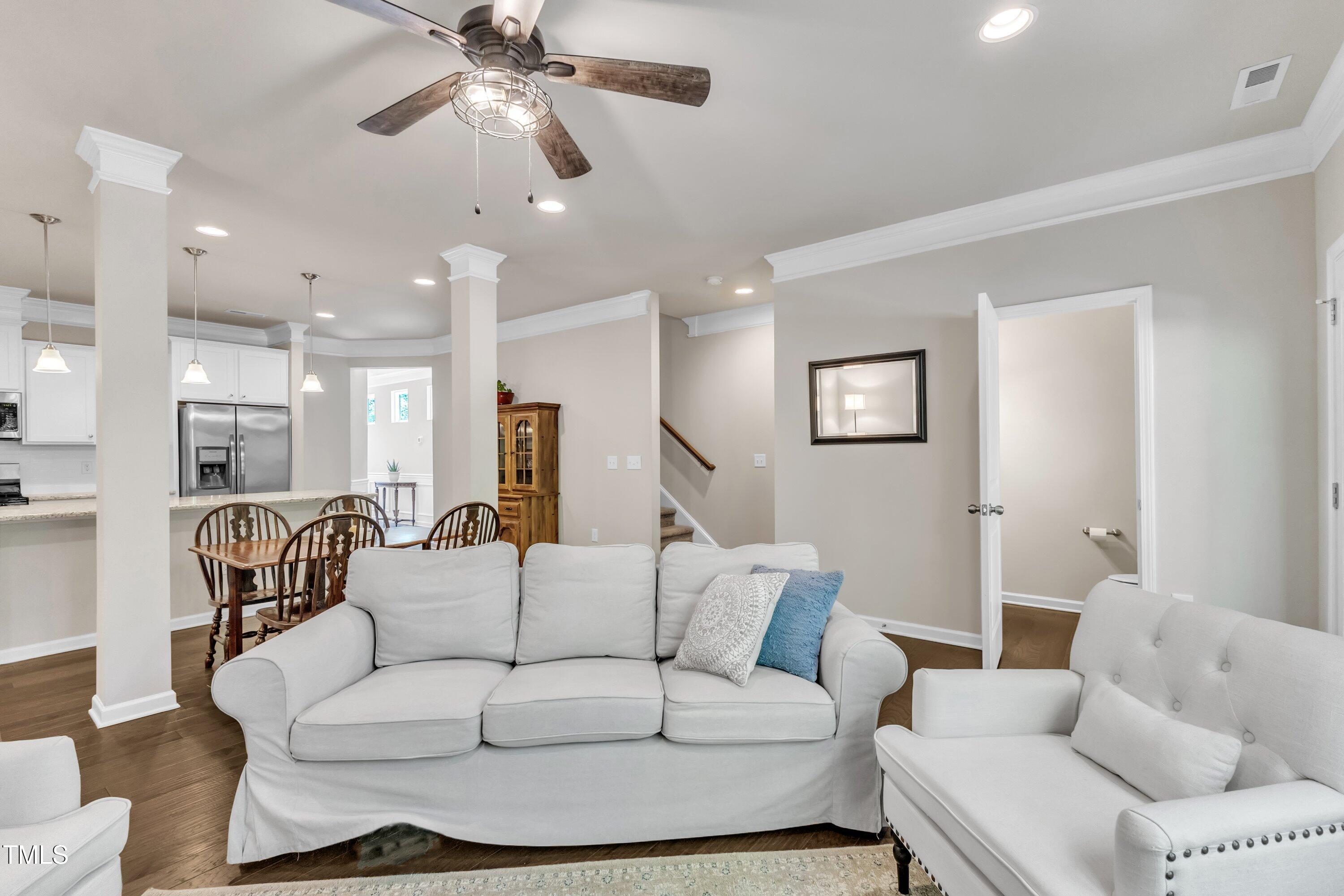 1230 Wingstem Place Raleigh, NC 27607 - Photo 16 of 41 a living room with furniture and a view of kitchen