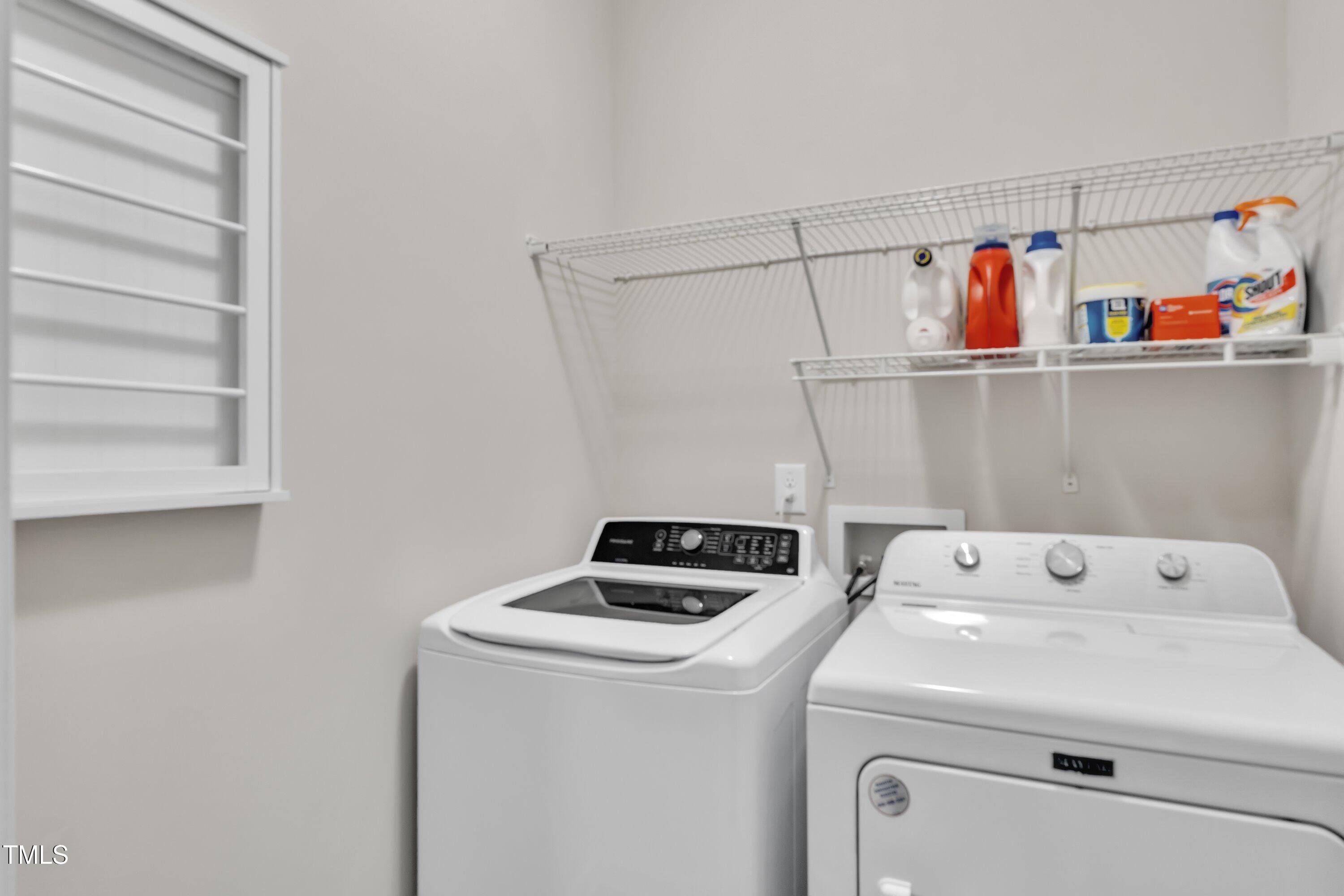 1230 Wingstem Place Raleigh, NC 27607 - Photo 26 of 41 a utility room with dryer and washer