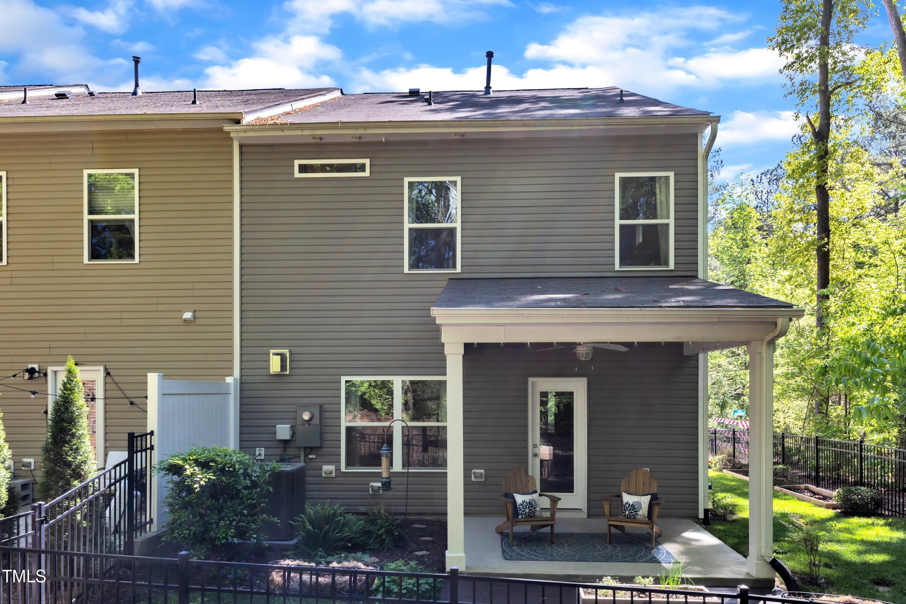 1230 Wingstem Place Raleigh, NC 27607 - Photo 37 of 41 a front view of a house with garden