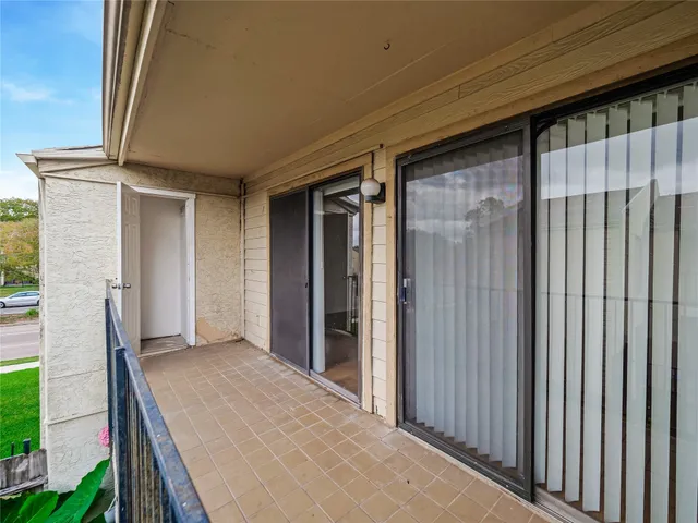 an aerial view of multiple house with yard