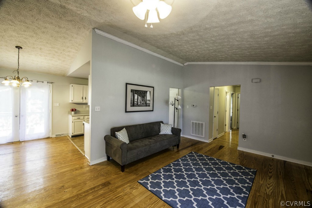 15176 Verdon Road Beaverdam, VA 23015 - Photo 15 of 15 a living room with furniture and a rug