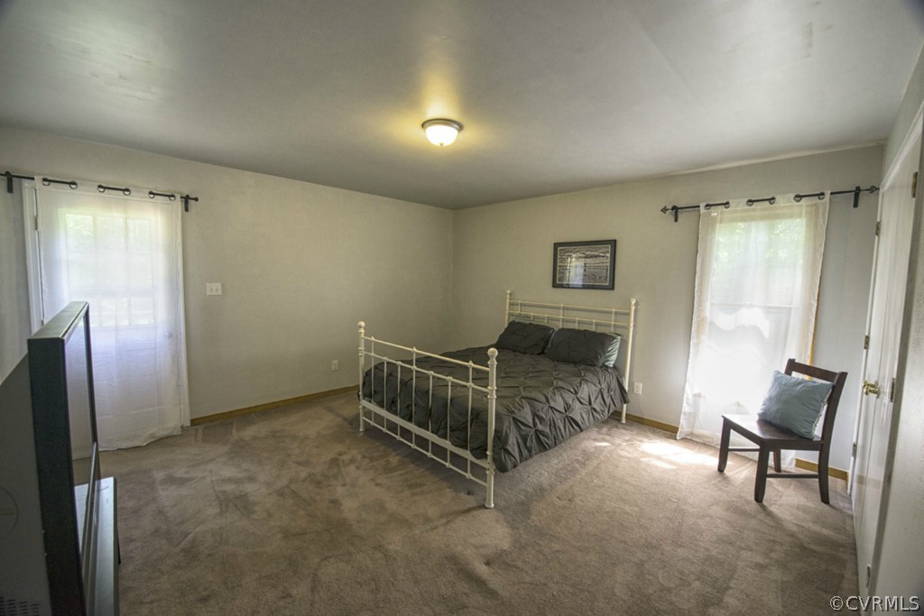 15176 Verdon Road Beaverdam, VA 23015 - Photo 7 of 15 a bedroom with furniture and a window