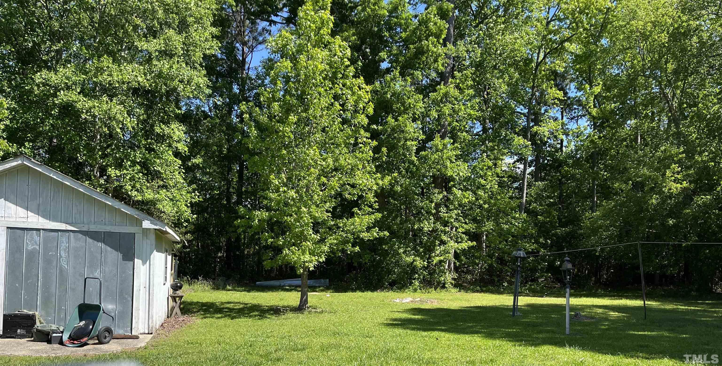 1620 Ridge Road Zebulon, NC 27597 - Photo 4 of 7 a view of a garden