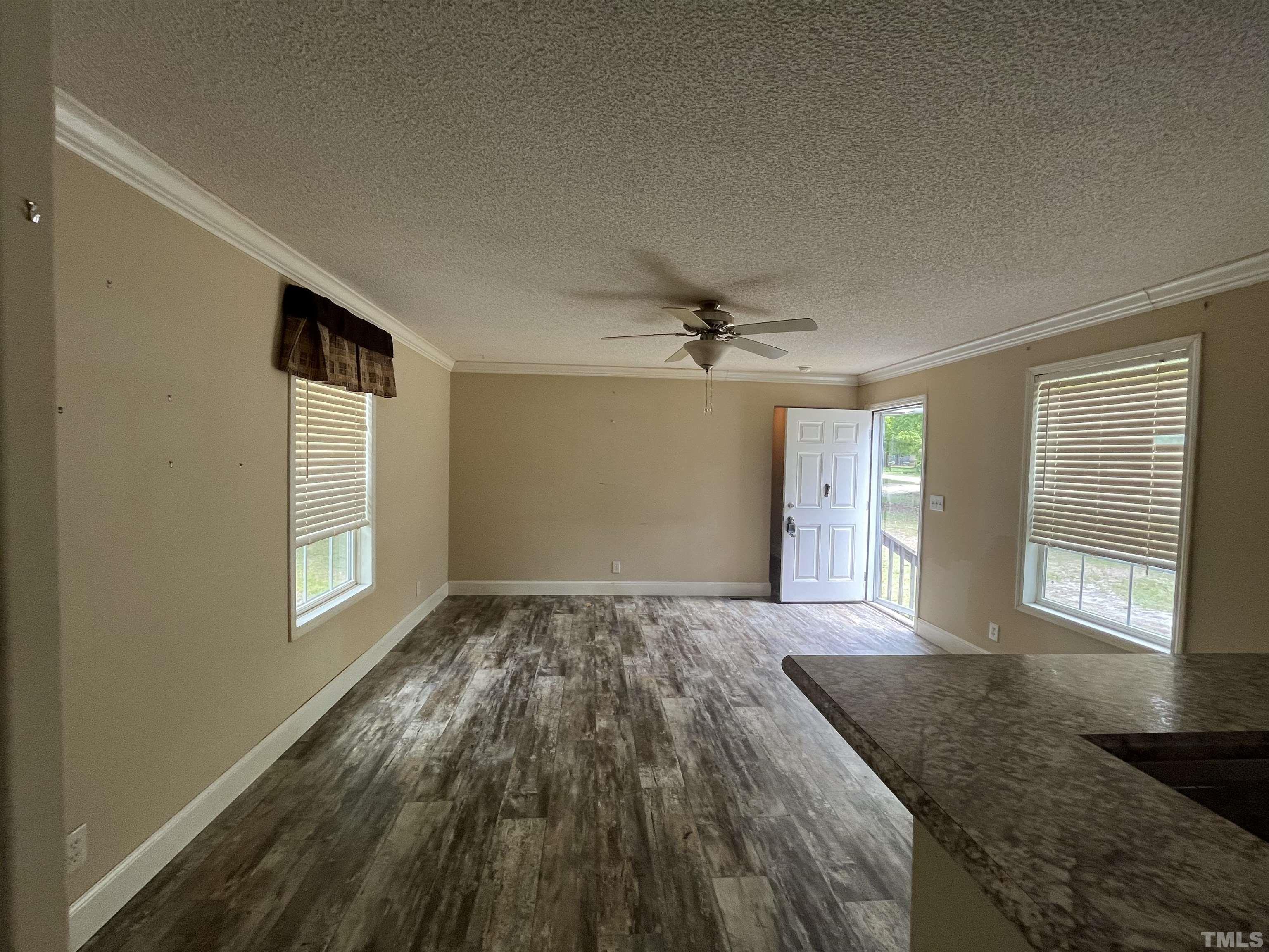 1620 Ridge Road Zebulon, NC 27597 - Photo 5 of 7 a view of an empty room and window