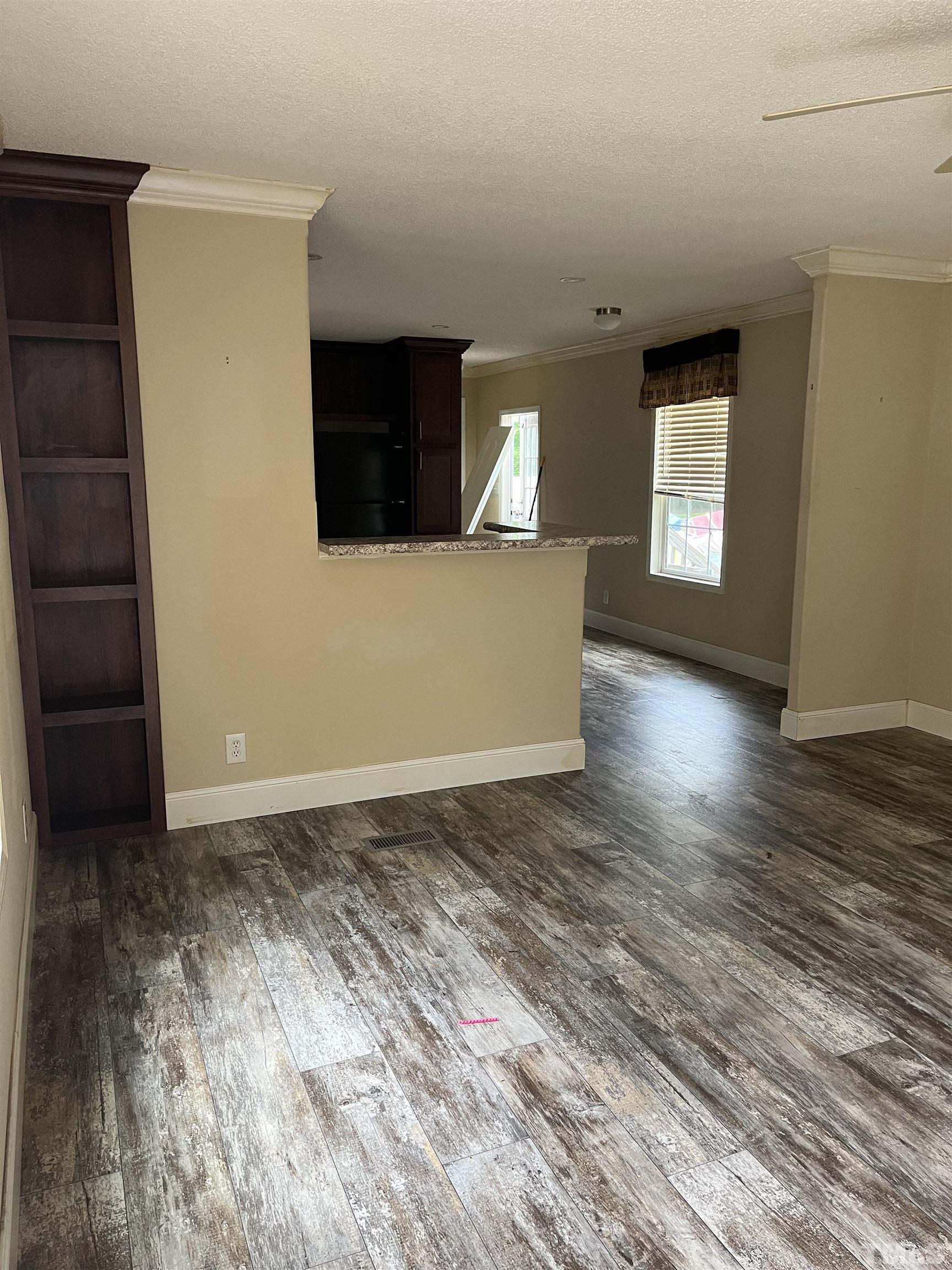 1620 Ridge Road Zebulon, NC 27597 - Photo 6 of 7 a view of entryway with wooden floor