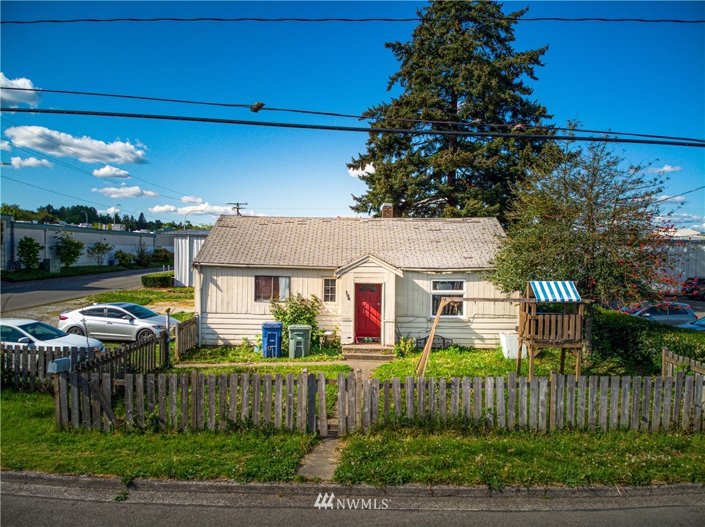 108 South Tobin Street Renton, WA 98057 - Photo 1 of 10 a view of a house with a garden