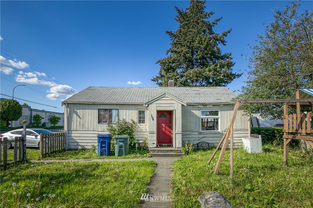 108 South Tobin Street Renton, WA 98057 - Photo 10 of 10 a front view of house with yard and green space