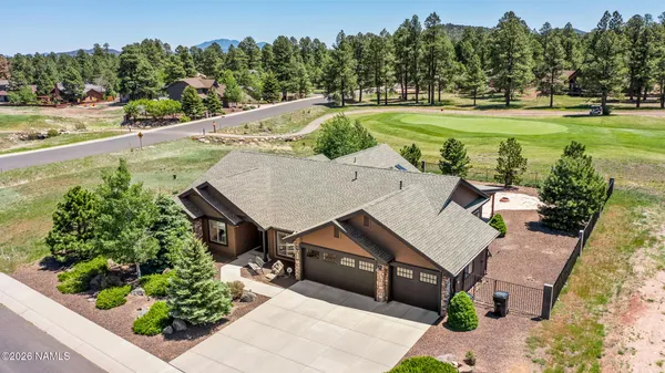 an aerial view of a house with a garden view