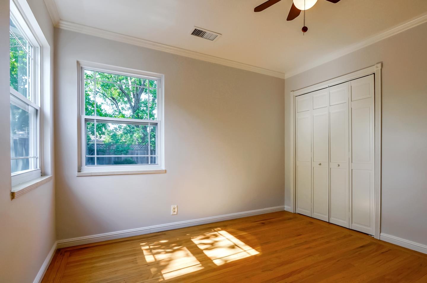 1228 Ruby Street Redwood City, CA 94061 - Photo 14 of 28 a view of an empty room with a window