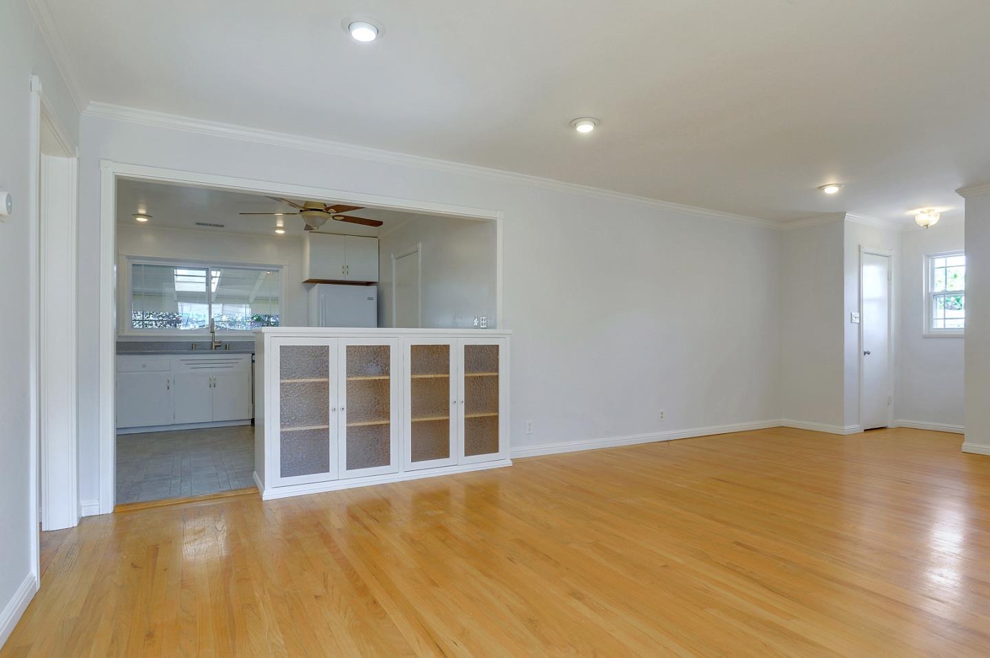 1228 Ruby Street Redwood City, CA 94061 - Photo 6 of 28 a view of an empty room with a window