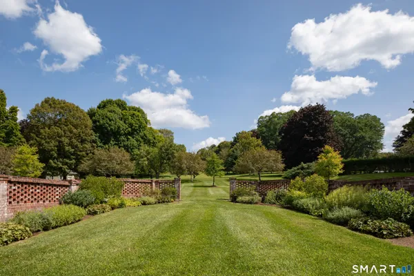 a view of a house with a big yard