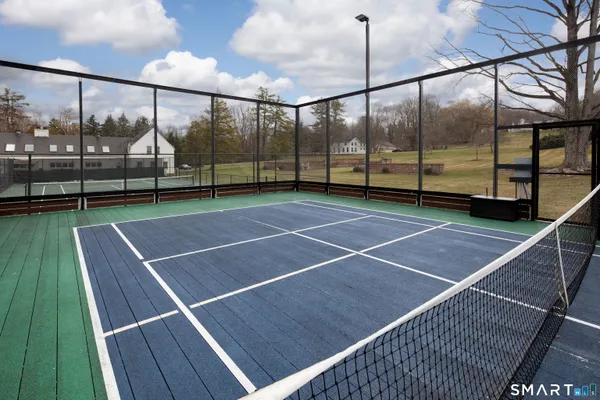 a view of an outdoor space tennis court