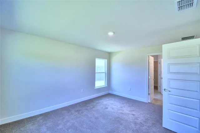 an empty room with closet