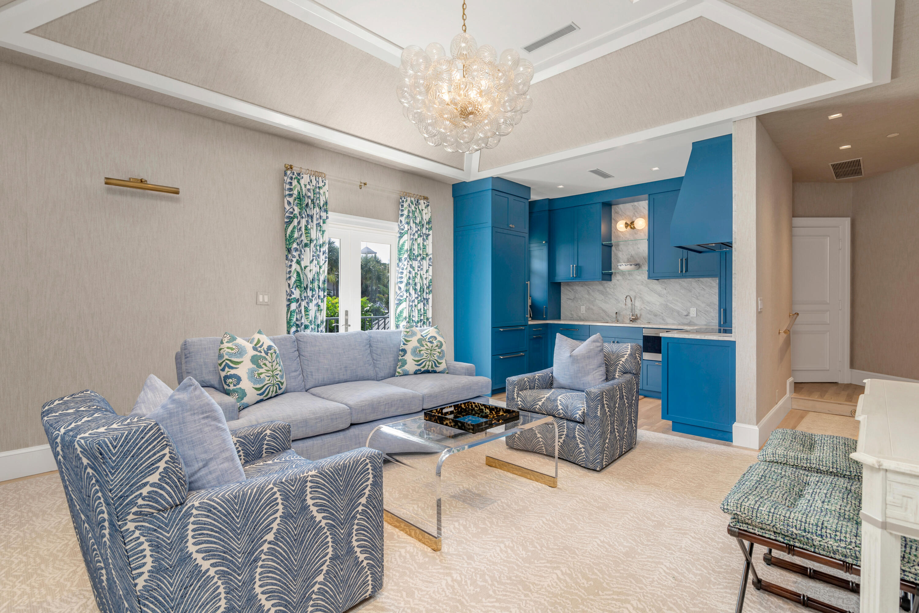 146 Sunset Avenue, Unit C Palm Beach, FL 33480 - Photo 3 of 18 a living room with furniture and a chandelier