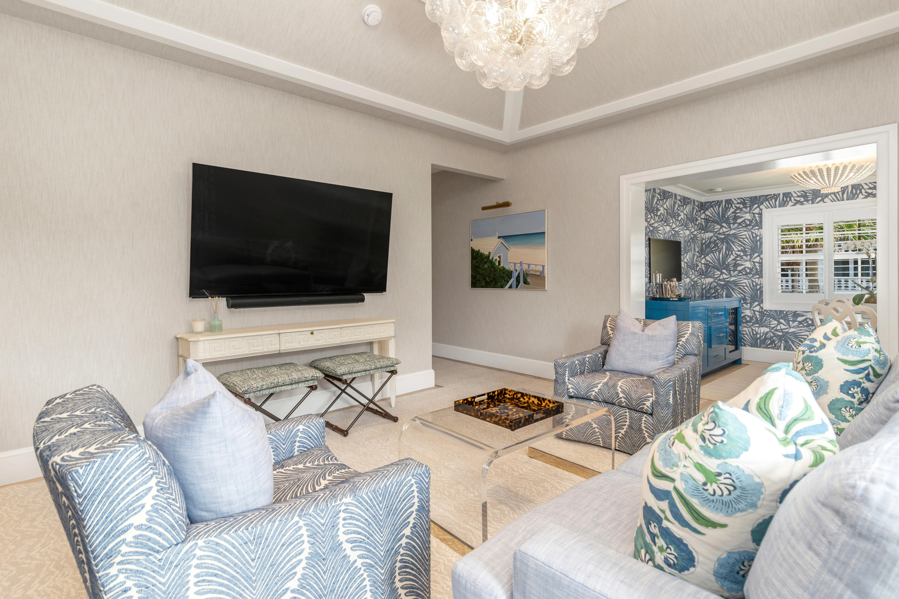 146 Sunset Avenue, Unit C Palm Beach, FL 33480 - Photo 4 of 18 a living room with furniture and a flat screen tv