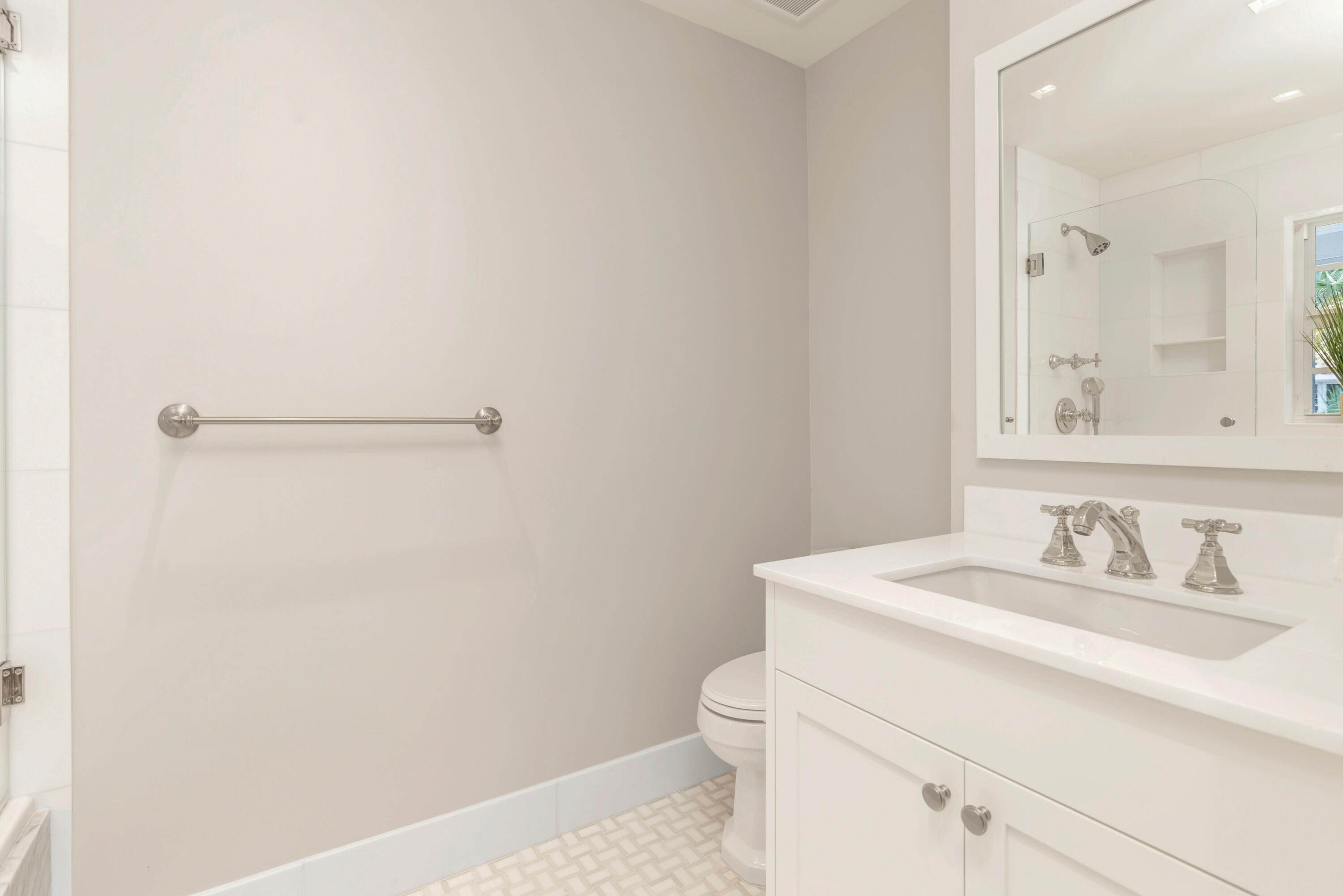 146 Sunset Avenue, Unit C Palm Beach, FL 33480 - Photo 6 of 18 a bathroom with a sink and a mirror