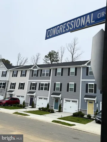 a view of a building with a street
