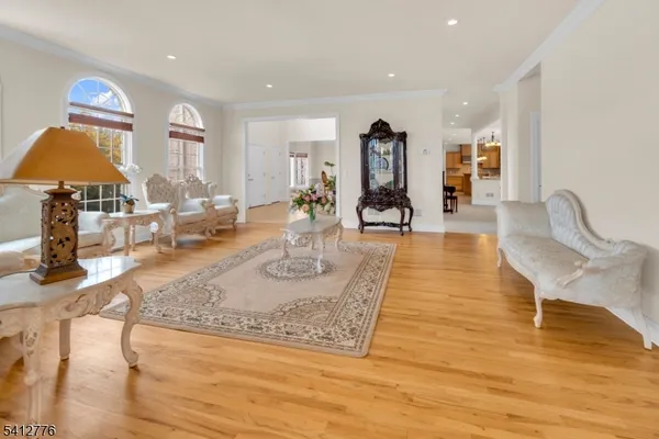 a view of a living room and kitchen