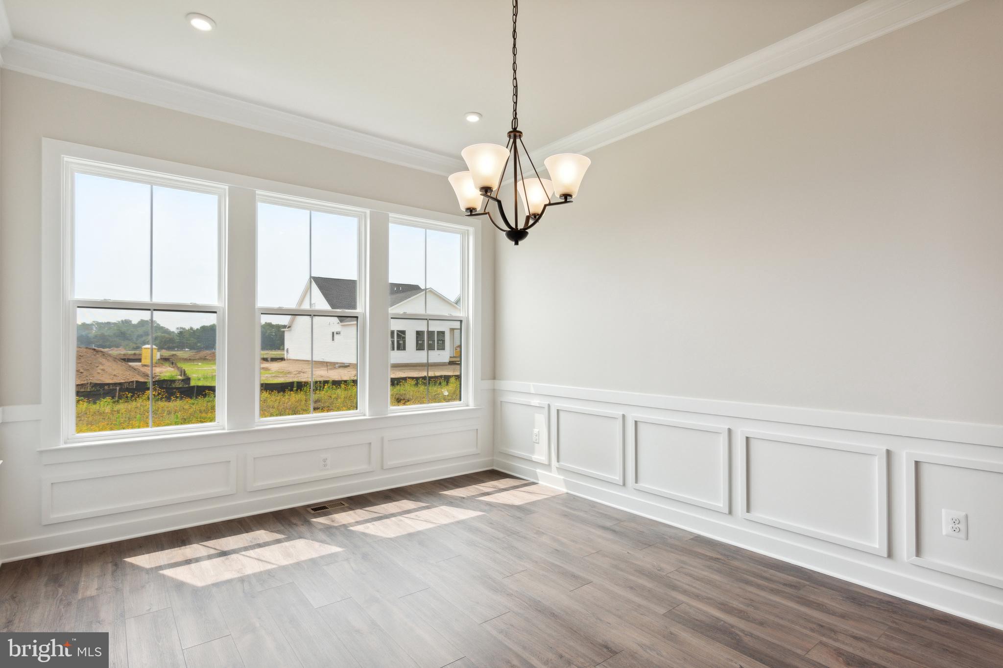 21 Golden Raintree Court Middletown, DE 19709 - Photo 10 of 28 a view of an empty room with a window