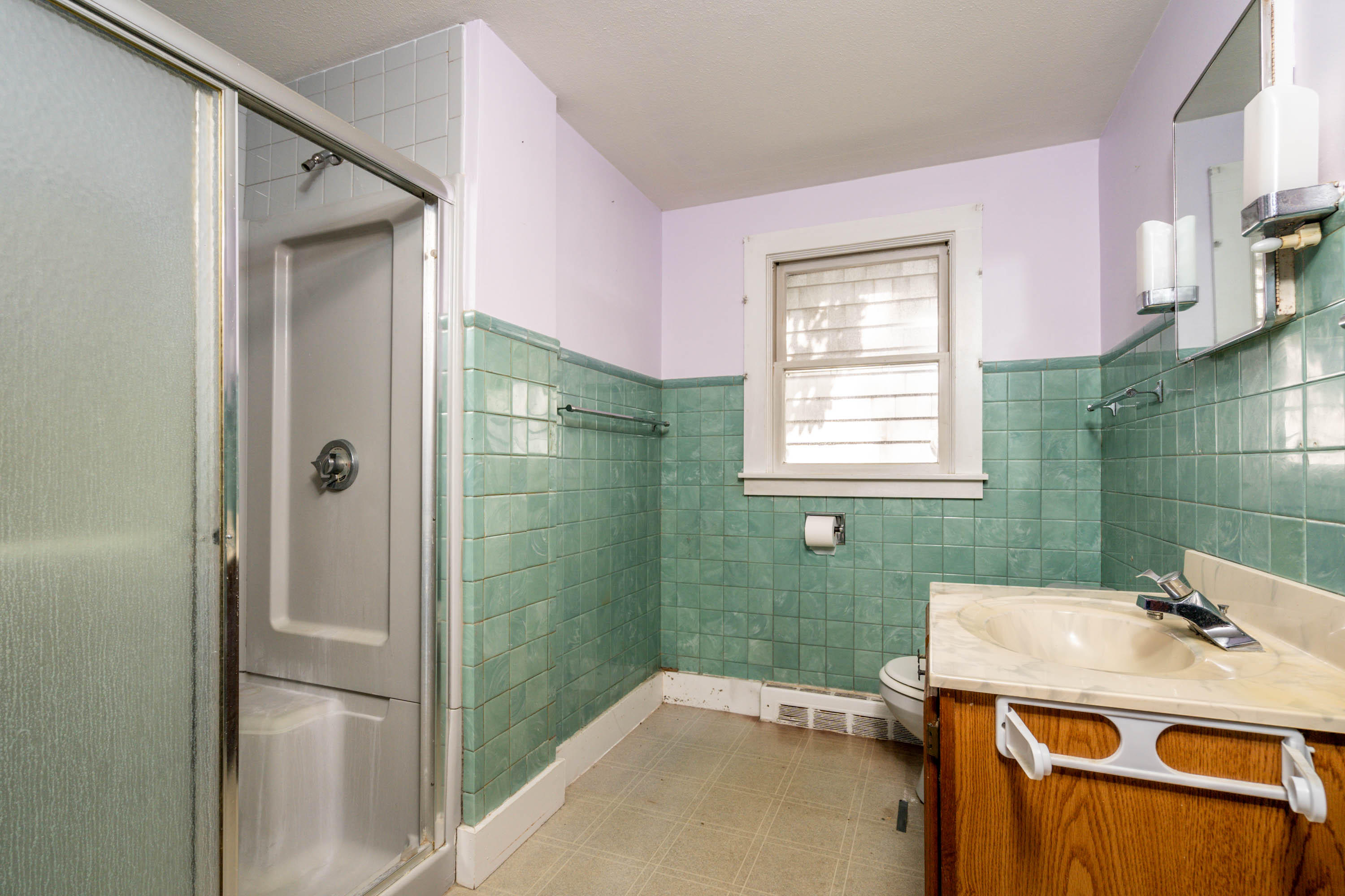 66 Pilgrim Spring Road Wellfleet, MA 02667 - Photo 15 of 21 a bathroom with a tub sink and mirror