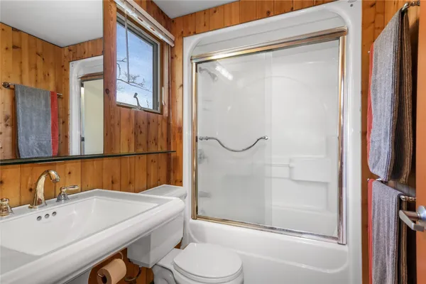 a bathroom with a sink and a bathtub