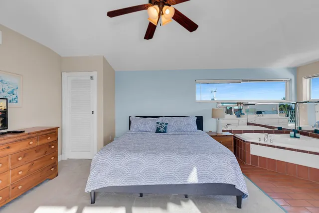 a bedroom with a bed and furniture