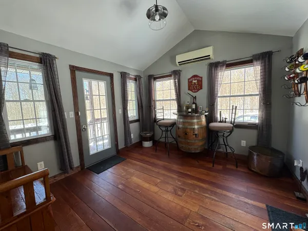 a kitchen with granite countertop a stove and a refrigerator