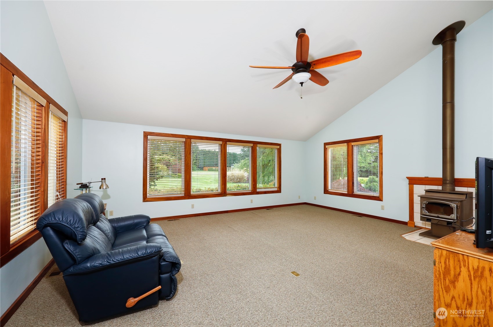 878 North Kendall Road Sequim, WA 98382 - Photo 17 of 30 a living room with furniture and a window