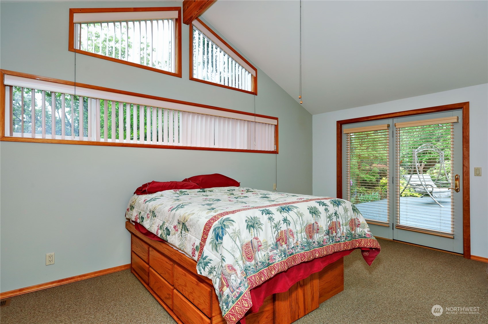 878 North Kendall Road Sequim, WA 98382 - Photo 21 of 30 a bed sitting in a bedroom next to a window