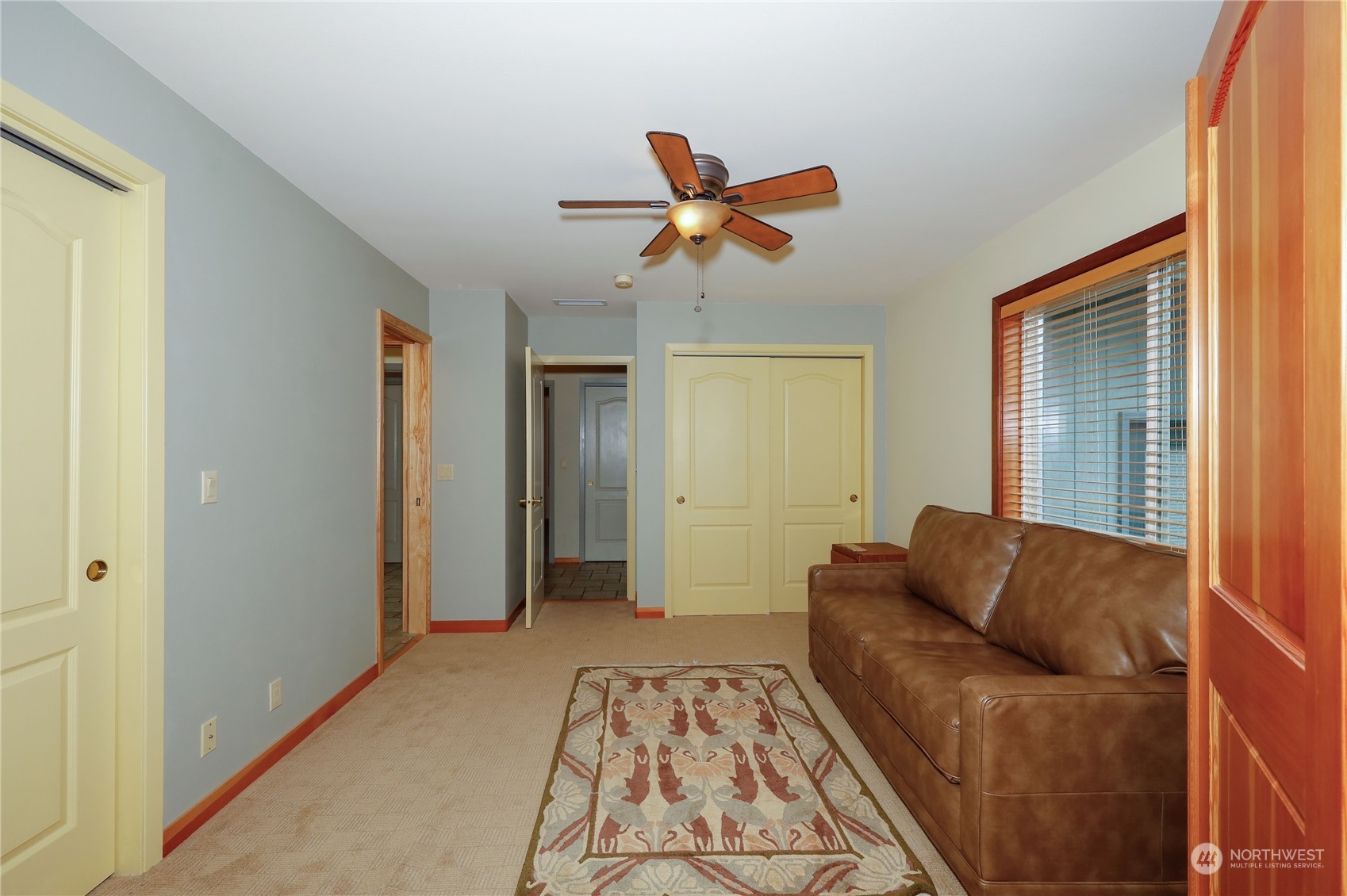 878 North Kendall Road Sequim, WA 98382 - Photo 24 of 30 a living room with furniture and a window