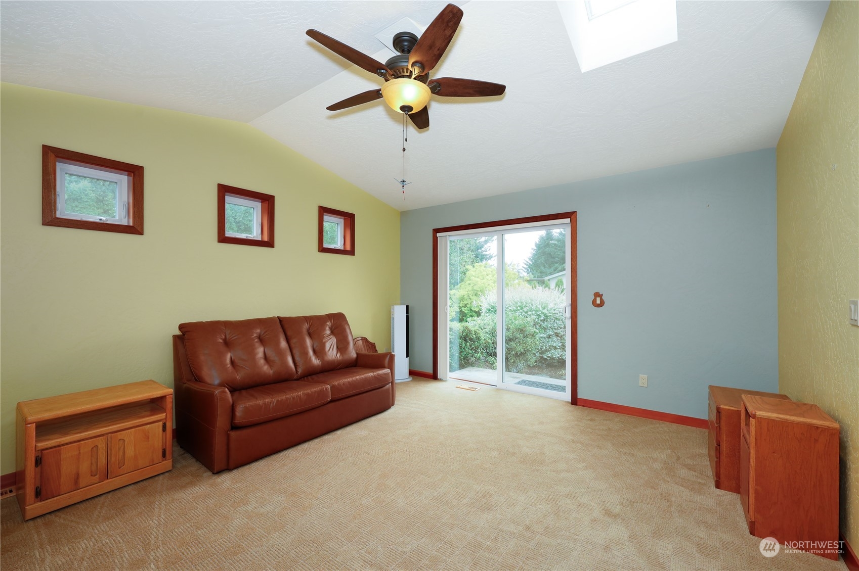878 North Kendall Road Sequim, WA 98382 - Photo 25 of 30 a living room with furniture and a window
