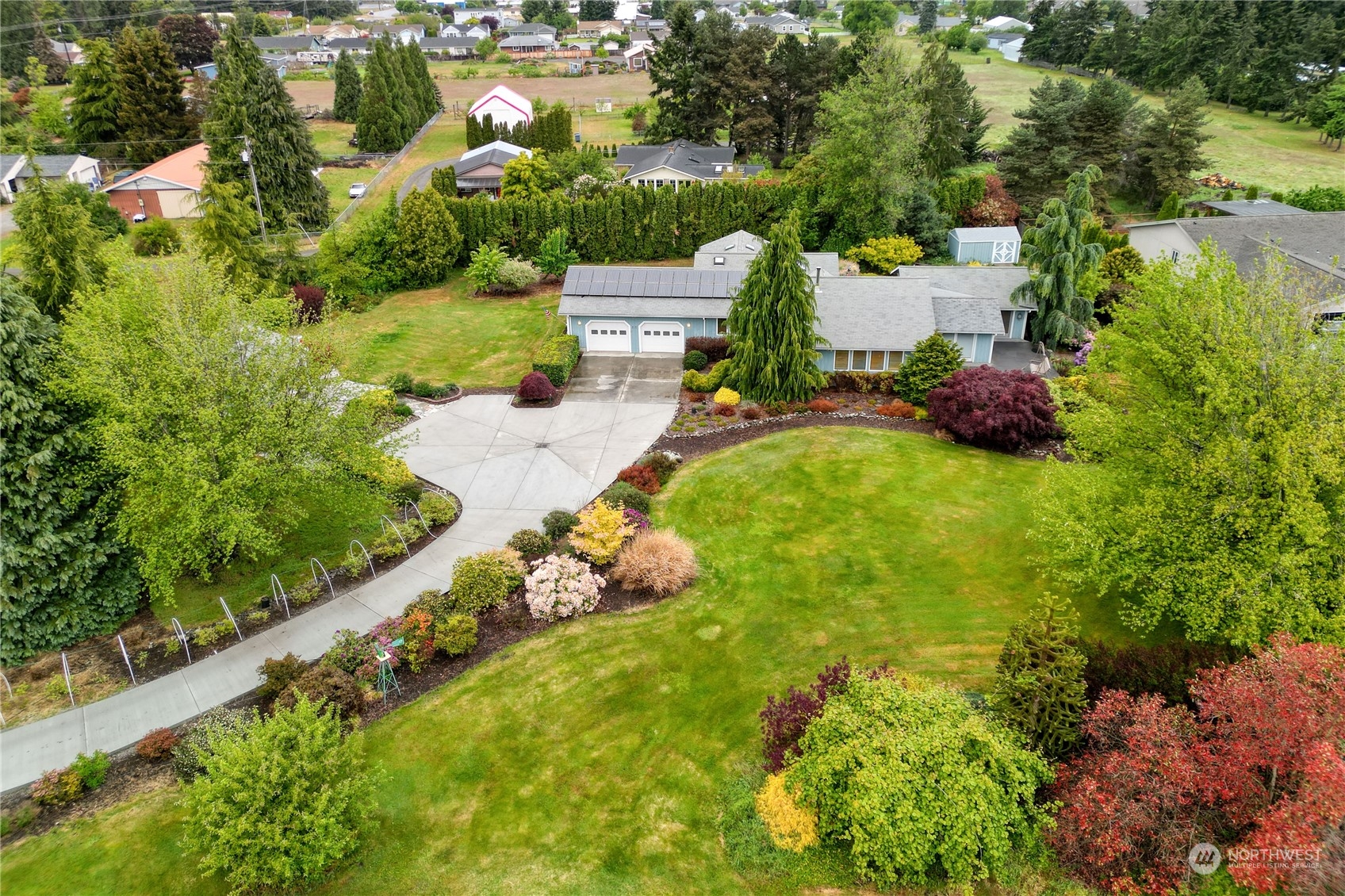 878 North Kendall Road Sequim, WA 98382 - Photo 29 of 30 a view of a garden with swimming pool