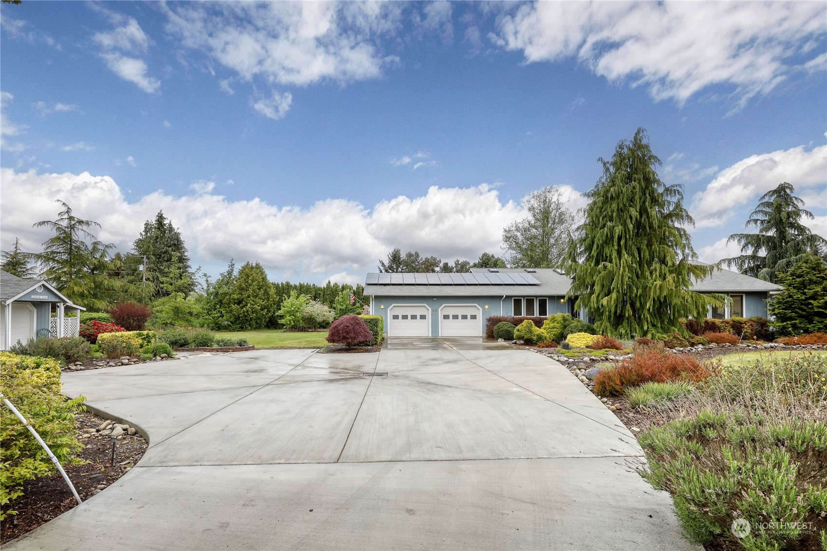 878 North Kendall Road Sequim, WA 98382 - Photo 3 of 30 a house view with a garden space